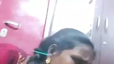 Mature tattooed Tamil wife giving handjob to husband